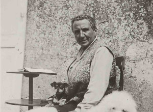 Gertrude Stein at Bilignin, France, with her dogs Pépé and Basket, ca. 1933