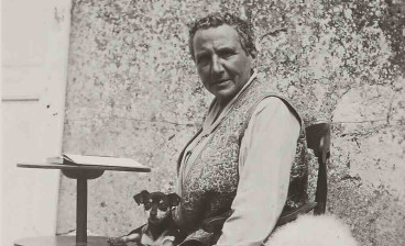 Gertrude Stein at Bilignin, France, with her dogs Pépé and Basket, ca. 1933
