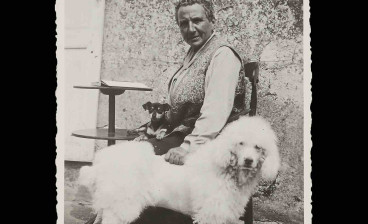 Gertrude Stein at Bilignin, France, with her dogs Pépé and Basket, ca. 1933