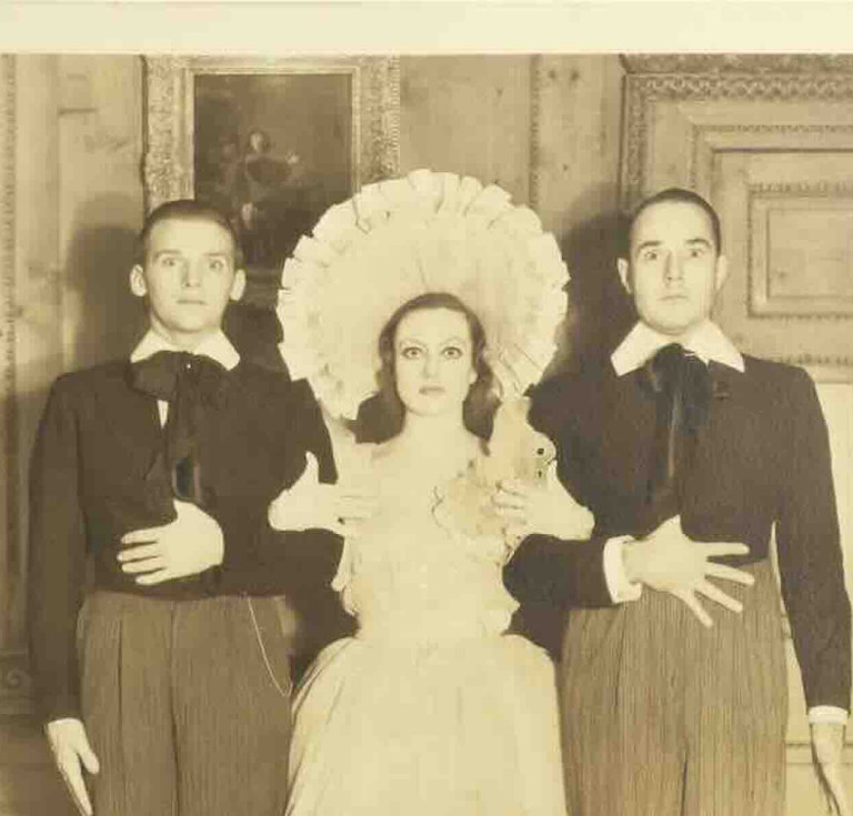A gelatin silver print of William Haines, Joan Brawford, and Douglas Fairbanks Jr., circa 1932, estimated at $800-$1,200